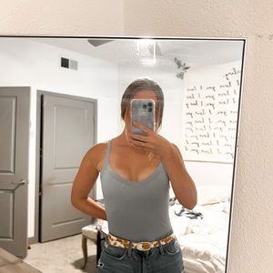 Pale dusty blue body suit